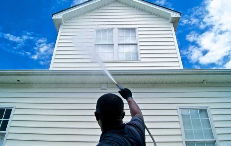 Maximizing the Value of Your Property with Seasonal Pressure Washing and Gutter Cleaning